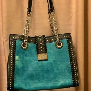American Bling turquoise and black alligator print concealed pocket handbag